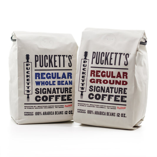 Two bags of Puckett's regular whole bean and ground signature coffees